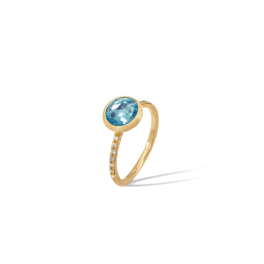 18kt yellow gold ring with sky topaz and diamonds