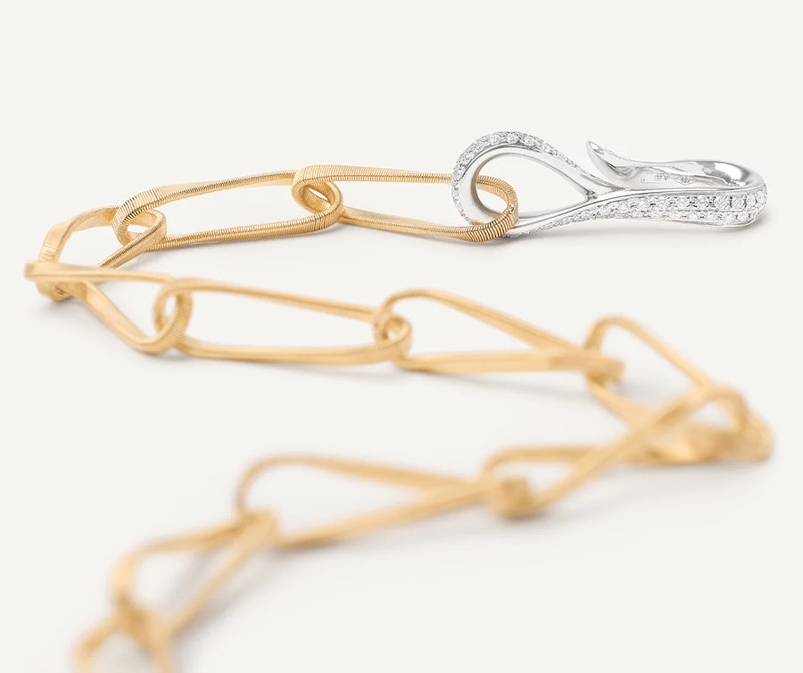 Marrakech Onde yellow gold twisted coil link lariat with diamond clasp