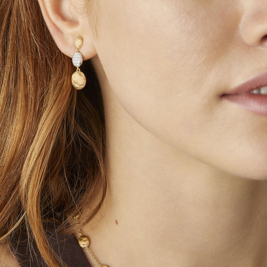 Gold triple earrings with diamonds
