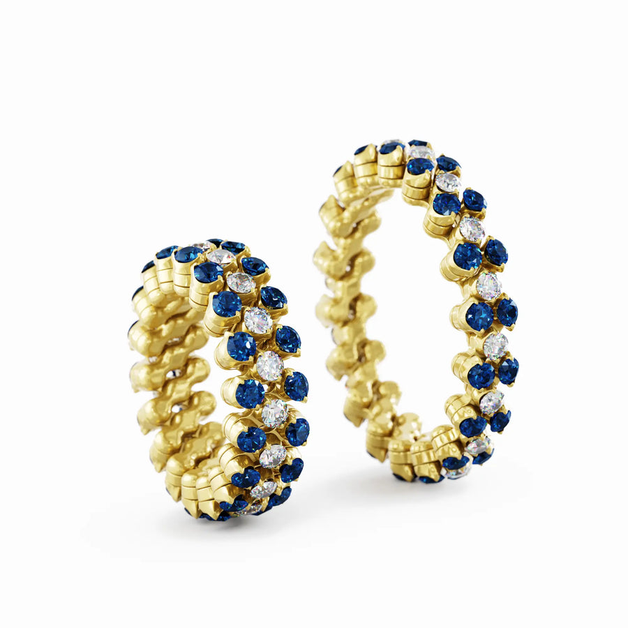 Serafino Consoli multi size ring in yellow gold, diamonds and sapphires